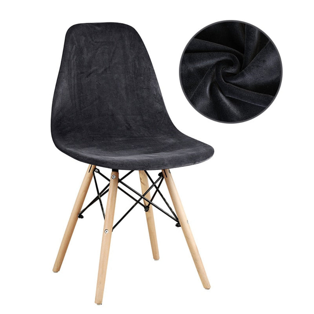 Housse noire lavable et antitache pour chaise scandinave, tissu extensible et résistant.