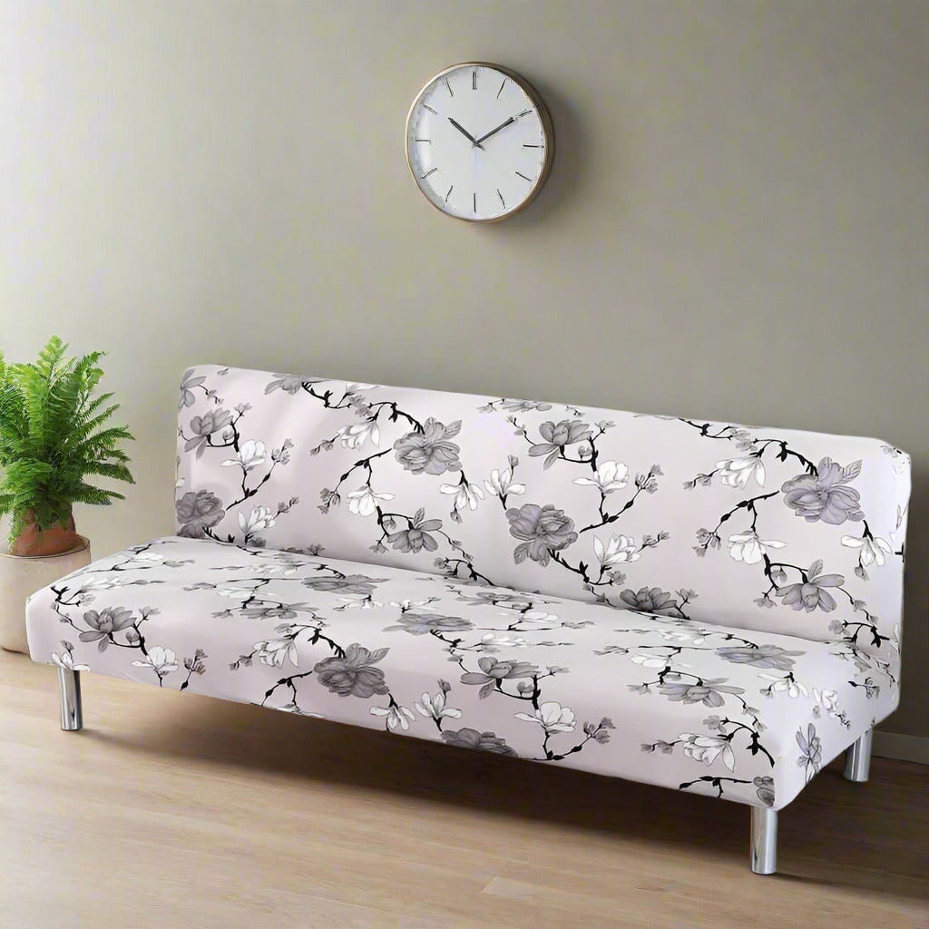 Housse de clic-clac extensible à motif floral noir et blanc sur fond beige clair, ambiance moderne et épurée